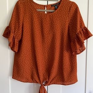 Polka dot tie up flowy blouse